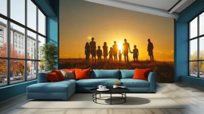 the silouhette of a family with many members, sunset light  Wall mural