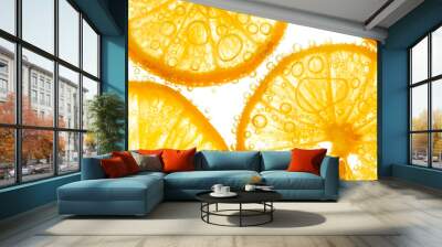 Fresh orange slice in water with bubbles on white background Wall mural