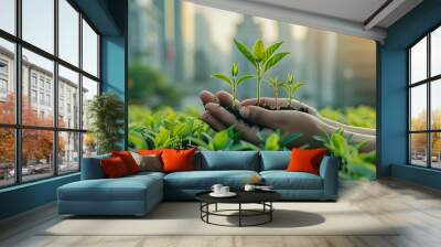 Hands Holding Saplings with Cityscape in the Background Wall mural