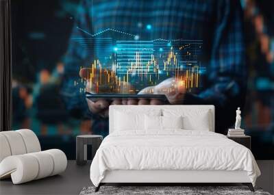 Person holding a smartphone with digital business analytics displayed, highlighting data analysis and financial trends. Wall mural