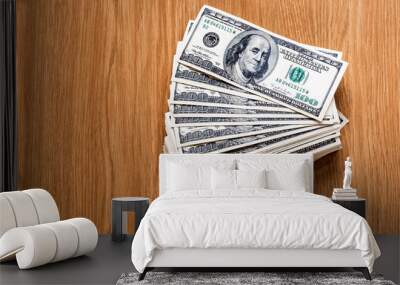 Pile of money over wood background Wall mural