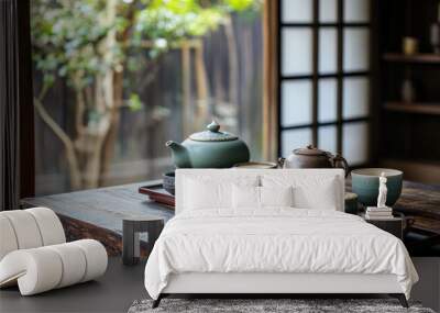 Traditional Japanese tea ceremony with beautiful teapots  cups  and delicate tea sets Wall mural