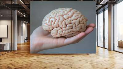 Hand Holding Human Brain - Futuristic Concept of Intelligence, science and mind , ai Wall mural