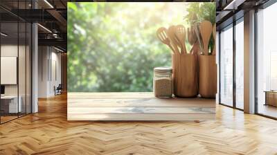 Kitchen wooden utensils and tool on wooden table top and blurred green garden outside the window background. Space for products and objects , ai Wall mural