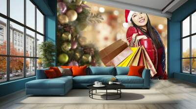 young asian woman shopping for christmas Wall mural