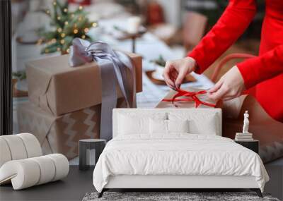 Packing of the christmas presents on a white background Wall mural