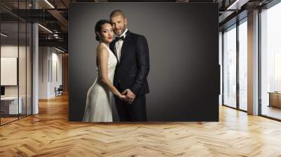 Couple Beauty Portrait, Handsome Man Well Dressed Black Suit and Beautiful Woman in White Dress Wall mural