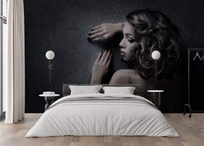 luxury woman hairstyle portrait over dark background Wall mural