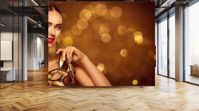 Woman Beauty and Carnival Mask, Beautiful Fashion Model Portrait on Golden Background Wall mural