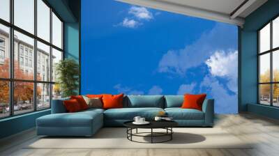 Beautiful blue sky background with tiny clouds. Wall mural