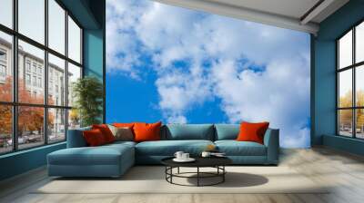 Beautiful blue sky background with tiny clouds. Wall mural