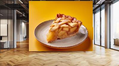 Apple pie slice on yellow background Wall mural