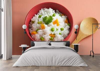 Delicious healthy vegetable basmati rice on coral colour background Wall mural