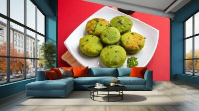 Indian vegetarian snack dish hara bhara kabab or kebab served chutney on red background Wall mural