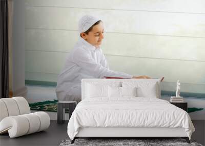 Muslim boy reading the Quran	 Wall mural