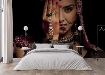 portrait of indian bride hiding half her face Wall mural