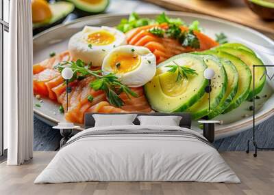 Smoked salmon, avocado, and poached eggs served on a white plate with fresh herbs and seasoning Wall mural