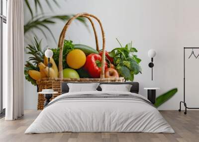 Eco-friendly wicker grocery bag with fresh fruits and vegetables. Wall mural