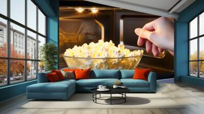 Heating fluffy popcorn in the microwave, making dry instant popcorn at home in the microwave. Wall mural