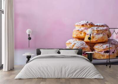 Scones with cream filling is a British sweet pastry for tea. Crispy wheat flour cookies on minimal table with copy space. A close-up of a scone dessert. Wall mural