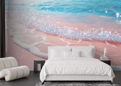 Shining sunny coastline with pink sand and texture of crystal clear sea water, foam and waves. Summer background with copy space Wall mural