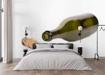 Empty bottle of champagne and muzzle with cork. Wall mural