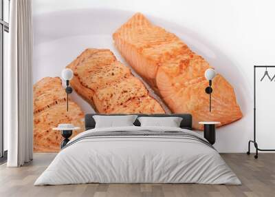 Slices of red fish fillet on plate. Wall mural