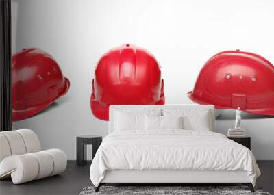 three identical red hard hat. Wall mural