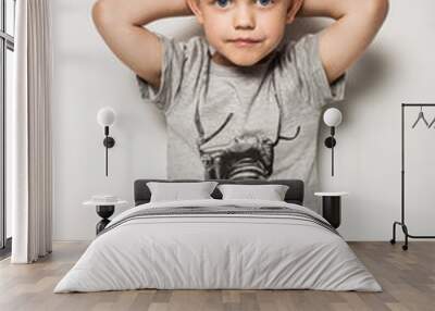 Little pretty boy posing at studio as a fashion model  Wall mural