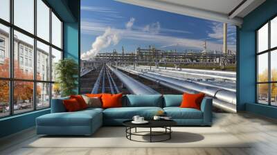 natural gas pipeline - pipes and buildings of a refinery - industrial plant for fuel production Wall mural