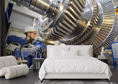 professional industrial Teamwork - workers manufacturing steam turbines in an industrial factory Wall mural