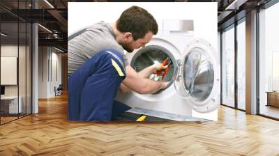 repair washing machine by a service technician at customer's home // insulated on white background Wall mural