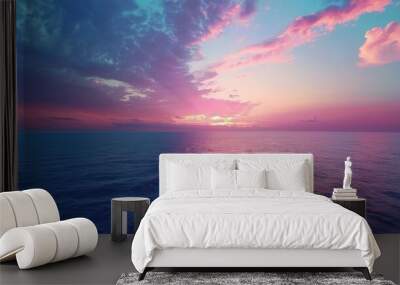 Evening sky with vibrant colors over a calm ocean Wall mural