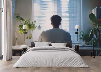 Simple and elegant study scene of young man at home, clean desk, modern minimalism, soft light Wall mural