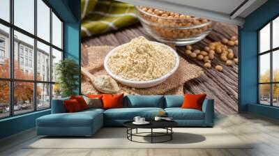 Product of soy flour in bowl with soybean, Kinako flour. Wall mural