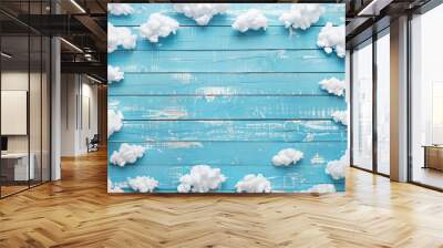 Mini clouds on blue wooden background, cotton wool clouds on blue wooden background Wall mural