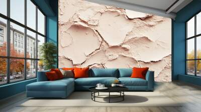 Textured beige surface with uneven edges and a powdery appearance against a softly blurred background in a minimalistic style Wall mural