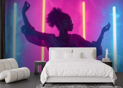 Woman dancing under neon lights. Wall mural