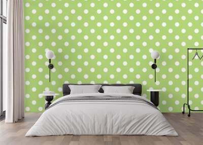 Seamless vector pattern with polka dots on green background Wall mural