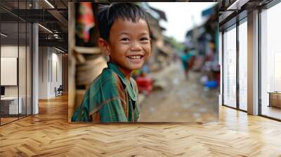 Portrait of a cute Asian boy smiling in the street, Thailand. Wall mural