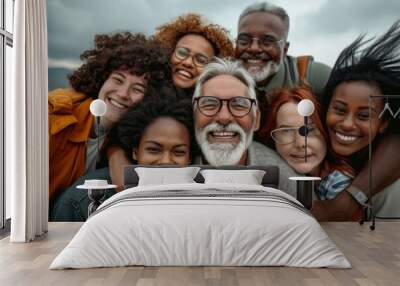 Portrait of a diverse group of friends standing together and smiling at the camera Wall mural