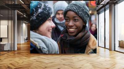 Portrait of happy multiethnic group of friends in winter clothes smiling Wall mural