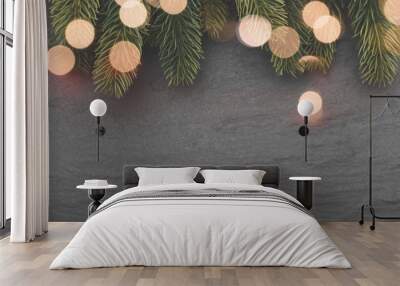 Christmas fir branches and lights Wall mural