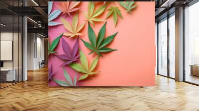 Colourful marijuana cannabis leaves on a pink background Wall mural