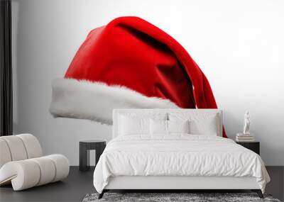 Festive Christmas santa hat isolated on a plain background Wall mural