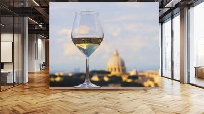 Glass of Italian white wine with St Peter's basilica, Rome, in the background Wall mural