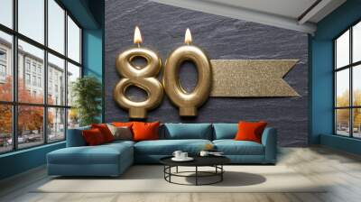 Gold number 80 celebration candle with glitter label Wall mural