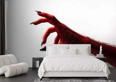 Halloween red devil monster hand with black fingernails against a plain background Wall mural