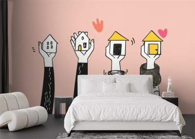 Hands holding up different small houses. real estate hand drawn style illustration Wall mural