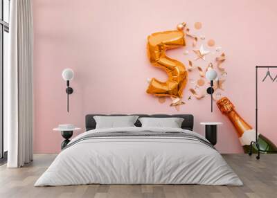 Happy 5th anniversary party. Champagne bottle with gold number balloon. Wall mural